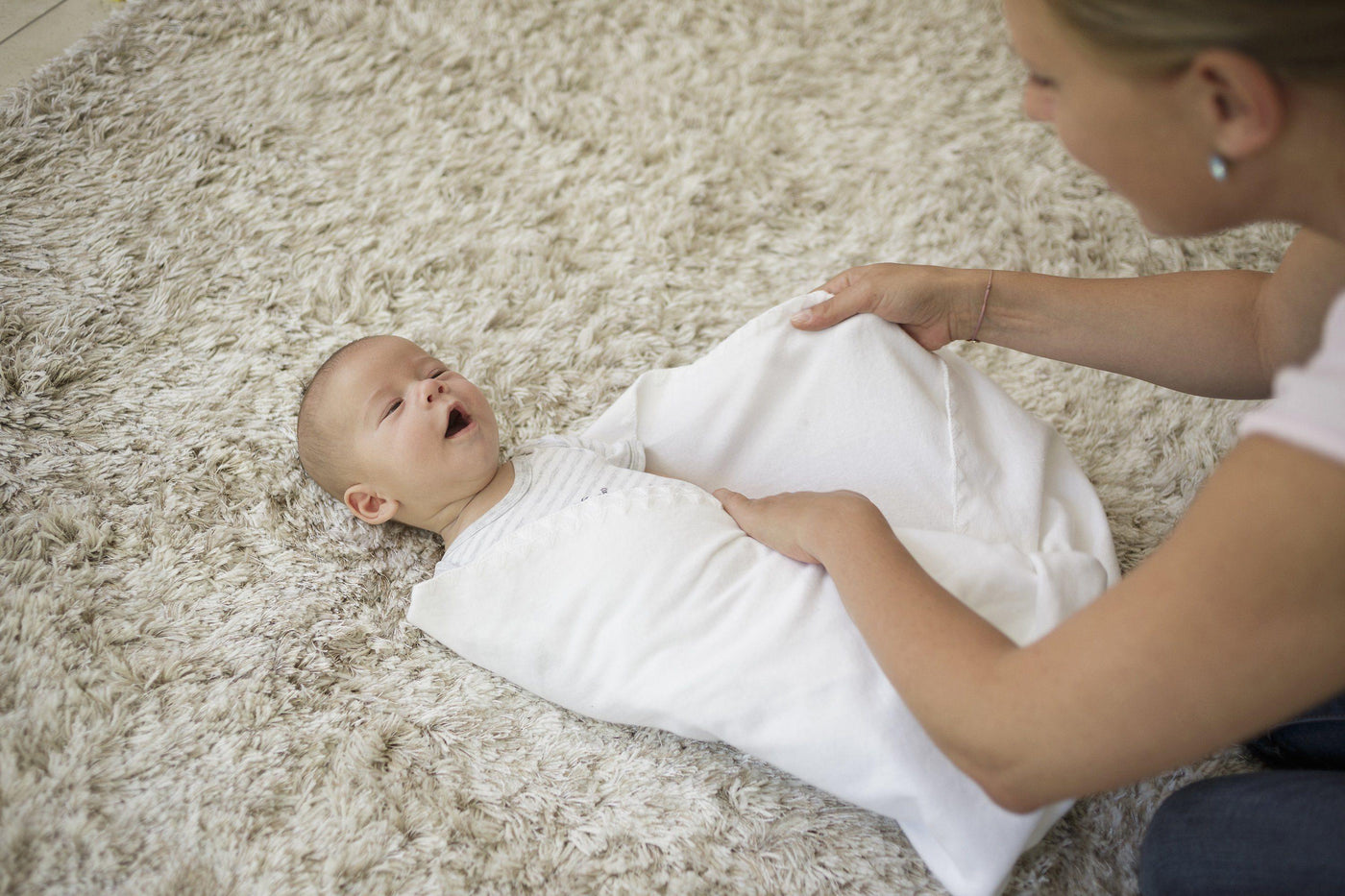 How To Swaddle Your Baby - A Step By Step Guide + Tips
